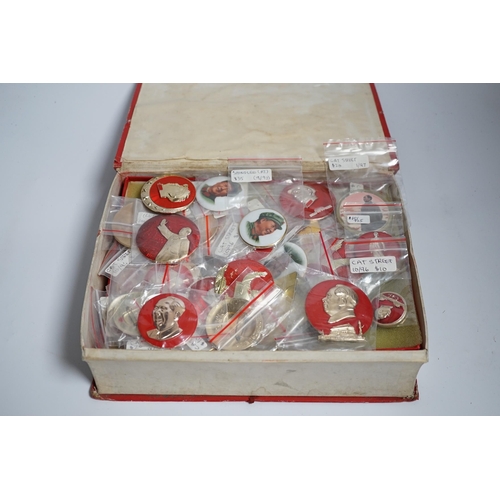 646 - A collection of forty one Chinese Mao Zedong badges and a box