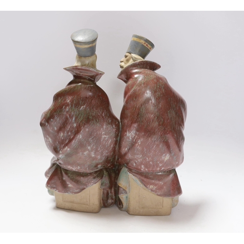 657 - A Lladro stoneware group of two priests, 29cm