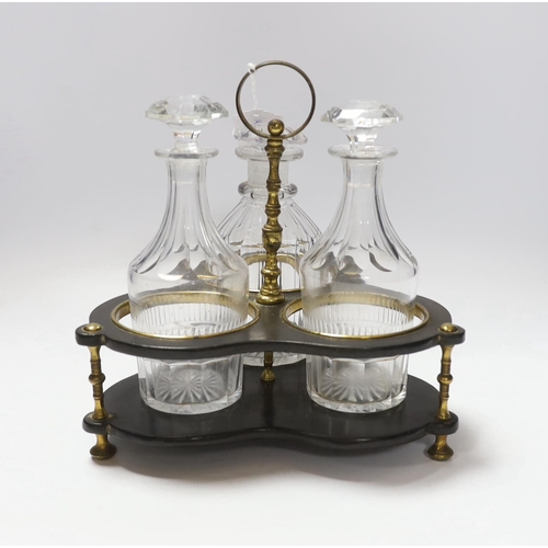 658 - A Regency decanter stand holding three associated cut glass decanters, 24cm