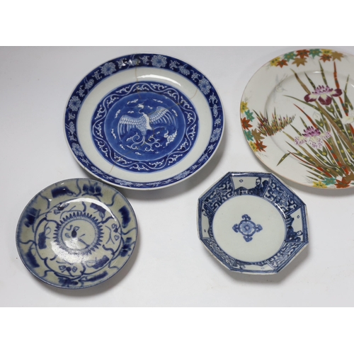 670 - A group of 18th century Chinese porcelain plates and saucers, mostly blue and white and an octagonal... 