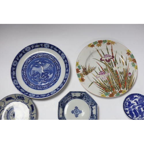 670 - A group of 18th century Chinese porcelain plates and saucers, mostly blue and white and an octagonal... 