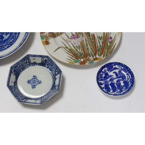 670 - A group of 18th century Chinese porcelain plates and saucers, mostly blue and white and an octagonal... 