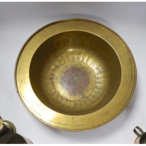 672 - A miner's brass Davy lamp, signed E.Thomas & Williams, a large brass bowl and three graduated copper... 