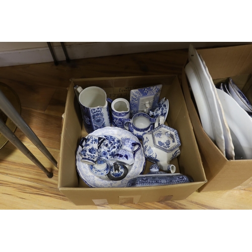 673 - A collection of 19th / 20th century blue and white pottery including platters, tureens and jugs... 