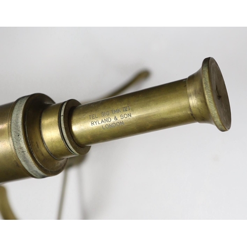 676 - A brass tripod telescope, 65cm wide