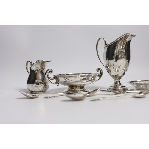 840 - Two George V silver cream jugs, largest 12.5cm, a silver two handled pedestal bowl, a pierced small ... 