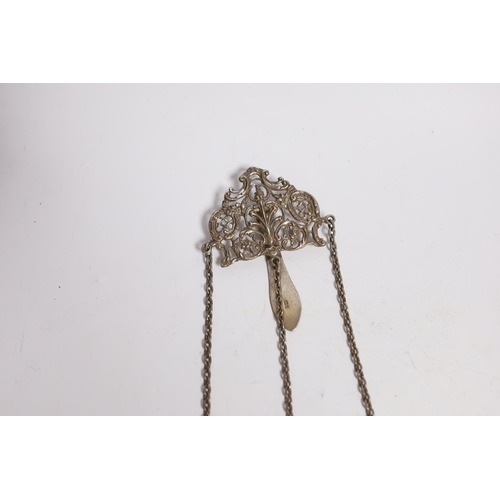 851 - A late Victorian pierced silver chatelaine by Levi & Salaman, Birmingham, 1900, hung with three asso... 