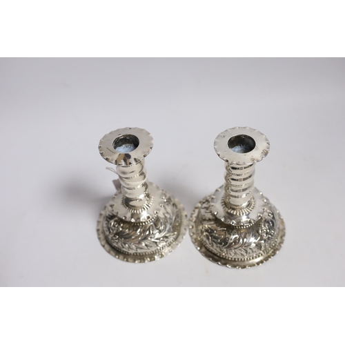 859 - A matched pair of Carolean style silver dwarf candlesticks, London, 1880 & 1885, makers mark on one ... 