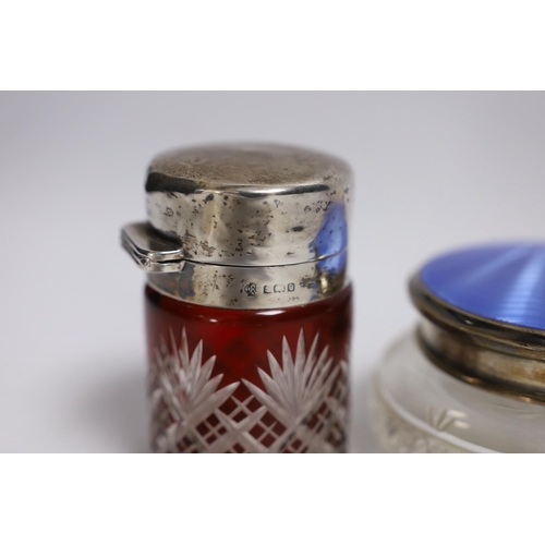 860 - A silver and enamel compact, a silver and enamel mounted glass jar and an Edwardian silver mounted c... 