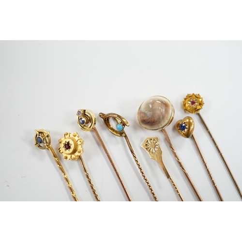 902 - Eight assorted early 20th century and later yellow metal and gem set stick pins, including six 15ct,... 