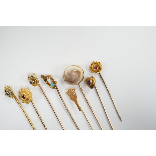 902 - Eight assorted early 20th century and later yellow metal and gem set stick pins, including six 15ct,... 