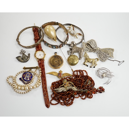 909 - Two wrist watches, assorted badges and costume jewellery including paste set.