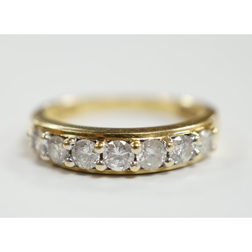 918 - A modern 18ct gold and seven stone diamond set half hoop ring, size N, gross weight 4 grams.