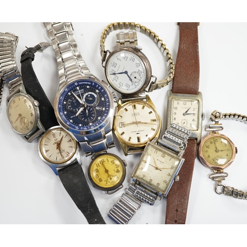 919 - A group of assorted mainly steel wrist watches including  three Cyma, a Roamer and modern Citizen Ec... 