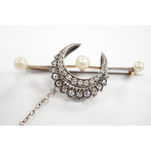 927 - A Victorian yellow  and white metal, diamond and pearl set crescent bar brooch, 44mm, gross weight 6... 