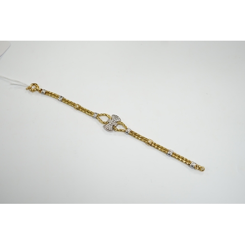 931 - A modern 750 yellow metal and diamond cluster set bracelet, 21.5cm, gross weight 33.9 grams.