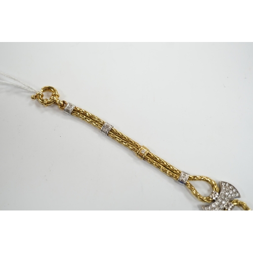 931 - A modern 750 yellow metal and diamond cluster set bracelet, 21.5cm, gross weight 33.9 grams.