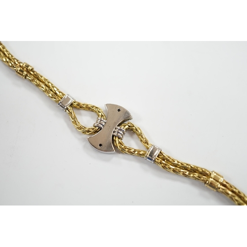 931 - A modern 750 yellow metal and diamond cluster set bracelet, 21.5cm, gross weight 33.9 grams.