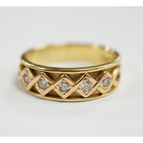 934 - A modern 18ct gold and five stone diamond set half hoop ring, size O, gross weight 6.2 grams.