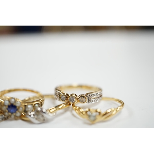 935 - Three assorted modern 9ct gold and diamond set rings, gross 6.5 grams and two other yellow metal and... 