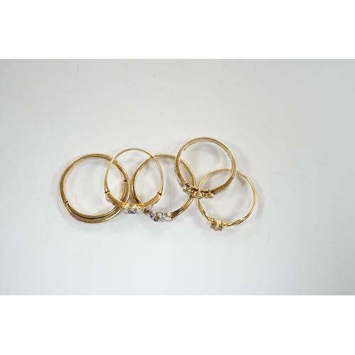 935 - Three assorted modern 9ct gold and diamond set rings, gross 6.5 grams and two other yellow metal and... 