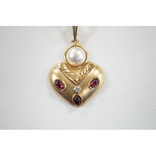 942 - A modern unmarked yellow metal, mabe pearl, cabochon garnet and diamond set pendant, width 28mm, gro... 