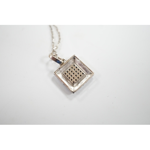 944 - A modern Italian 18k white metal and diamond chip set pendant, on an 18k chain, 42cm and a white met... 