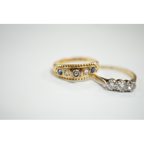 956 - An 18ct, plat and three stone diamond set ring, size K and a late Victorian 18ct gold three stone di... 