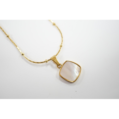 969 - A yellow metal and mother of pearl inset pendant, 11mm on a 18kt fine link chain, 42cm, gross weight... 