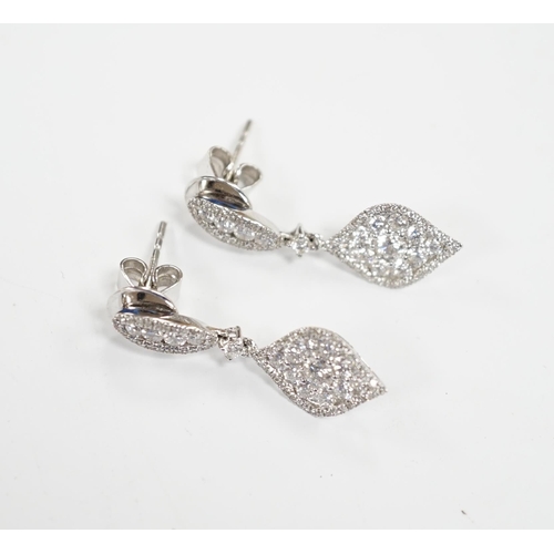 970 - A modern pair of 750 white metal and diamond cluster set drop earrings, of elliptical form, 26mm, gr... 