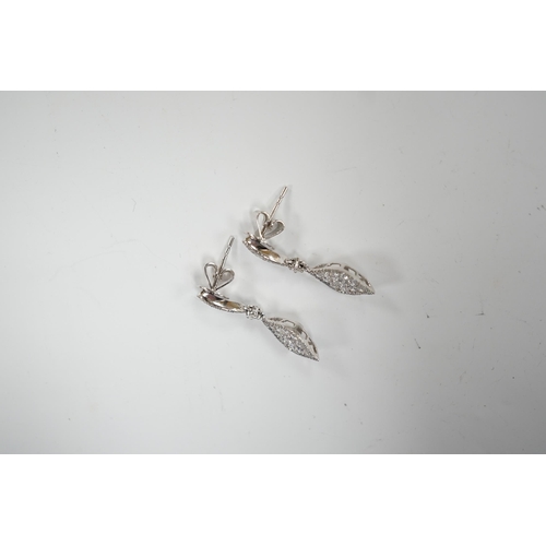 970 - A modern pair of 750 white metal and diamond cluster set drop earrings, of elliptical form, 26mm, gr... 