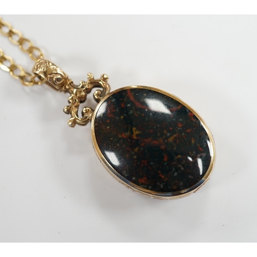 974 - A modern 9ct gold mounted carnelian and bloodstone set oval 'Millennium' pendant, by Davis Scott Wal... 