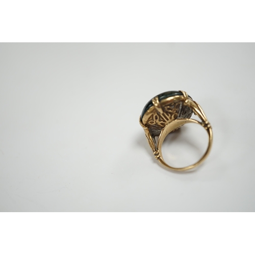 978 - A modern 9ct gold and circular moss agate set dress ring, size H, gross weight 9.5 grams.