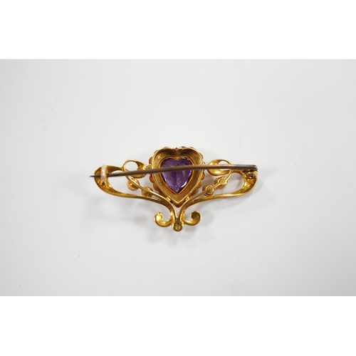 979 - An Edwardian 15ct?, amethyst and seed pearl cluster set bar brooch, with central heart motif, 38mm, ... 