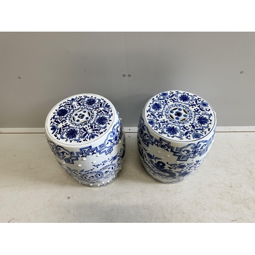 98 - A pair of modern Chinese blue and white earthenware seats, height 46cm