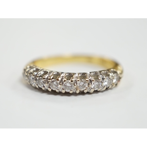 982 - A modern 750 yellow metal and nine stone diamond chip set half hoop ring, size I/J, gross weight 3.1... 