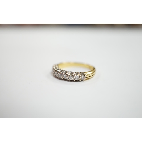 982 - A modern 750 yellow metal and nine stone diamond chip set half hoop ring, size I/J, gross weight 3.1... 