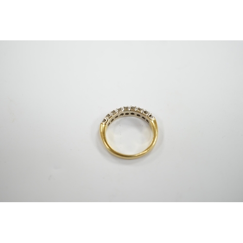 982 - A modern 750 yellow metal and nine stone diamond chip set half hoop ring, size I/J, gross weight 3.1... 