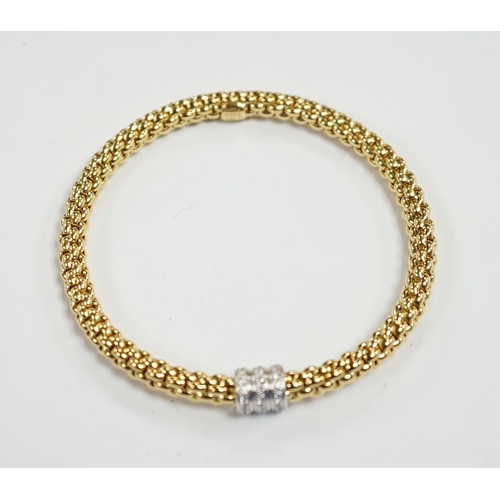 986 - An Italian 18kt Fope flexible bracelet, with diamond chip set barrel shaped motif, gross weight  17.... 