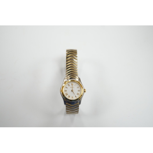 989 - A lady's modern steel and gold plated Ebel Classic quartz wrist watch, with Roman dial.