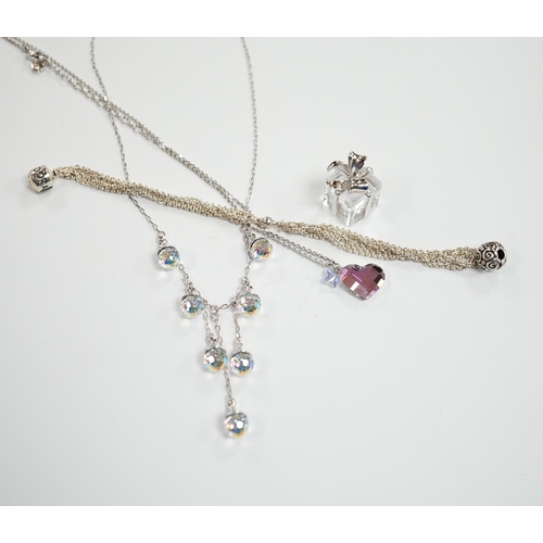 990 - Two modern Swarovski crystal necklaces, a similar 'present' charm and a Pandora bracelet.