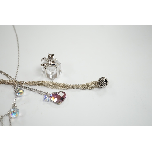 990 - Two modern Swarovski crystal necklaces, a similar 'present' charm and a Pandora bracelet.