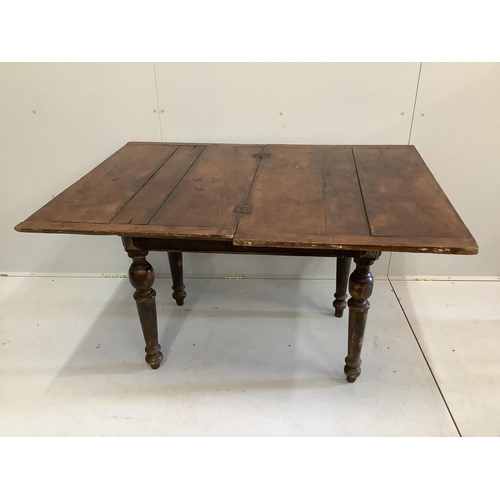 105 - A Continental pine folding kitchen table, width 100cm, depth 67cm, height 79cm