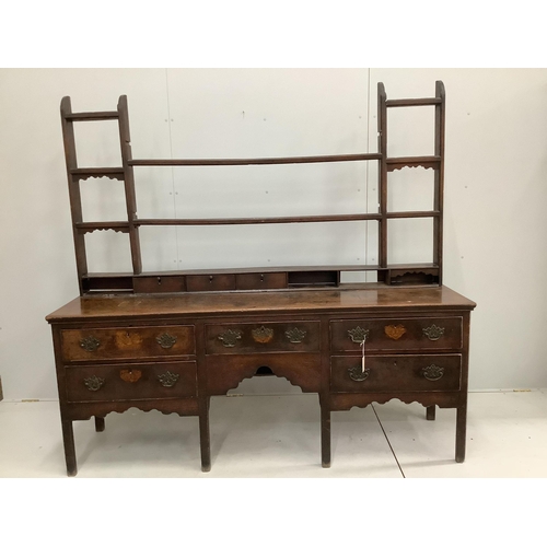 148 - An 18th century oak dresser with adapted rack, width 200cm, depth 51cm, height 81cm