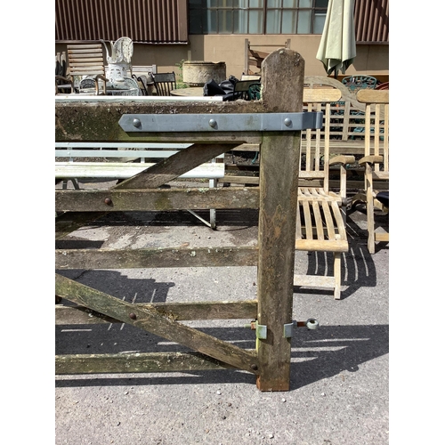 179 - A pair of 12ft Biddenden hardwood gates with galvanised mounts