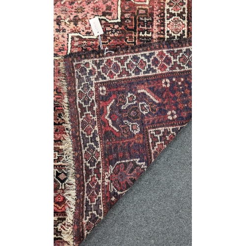 192 - A Persian Shiraz carpet, 300 x 220cm