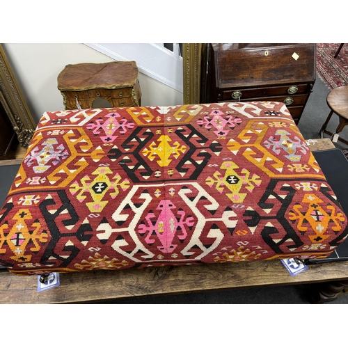 206 - A large contemporary rectangular footstool with antique polychrome Kilim upholstery on turned beech ... 