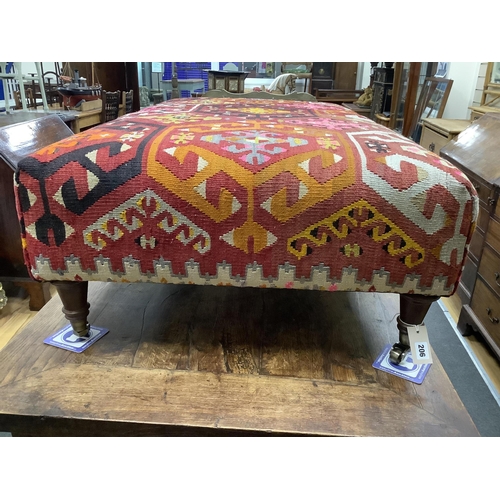 206 - A large contemporary rectangular footstool with antique polychrome Kilim upholstery on turned beech ... 