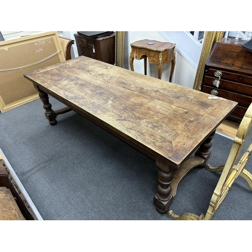 207 - A rectangular oak refectory dining table, length 217cm, width 87cm, height 74cm