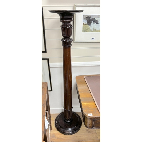 221 - A pair of William IV and later mahogany bedpost torchere stands, height 139cm